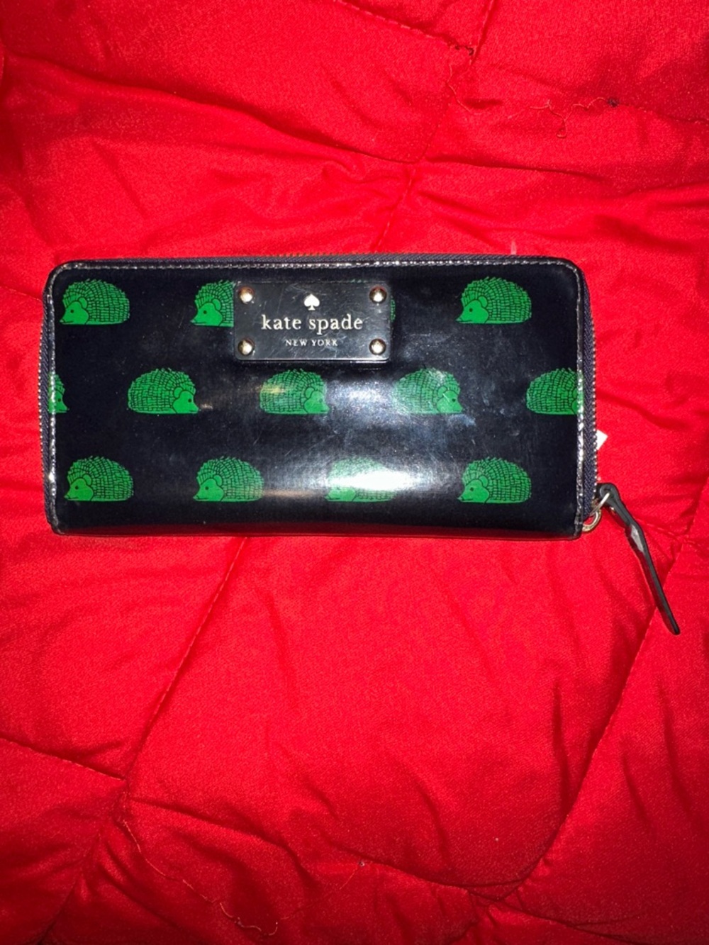 kate spade Black Patent Wallet with Green Hedgehog Print story book lining
